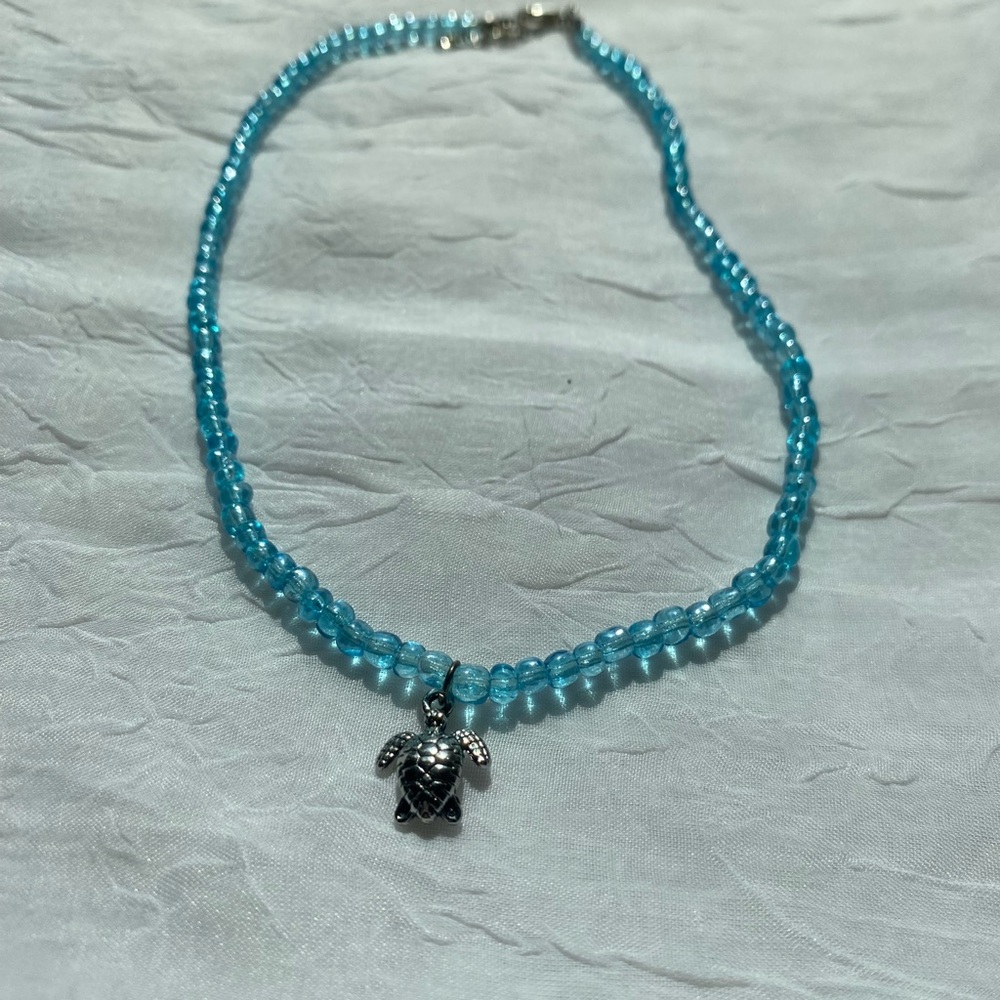 Silver Turtle Pendant on Blue Beaded Necklace